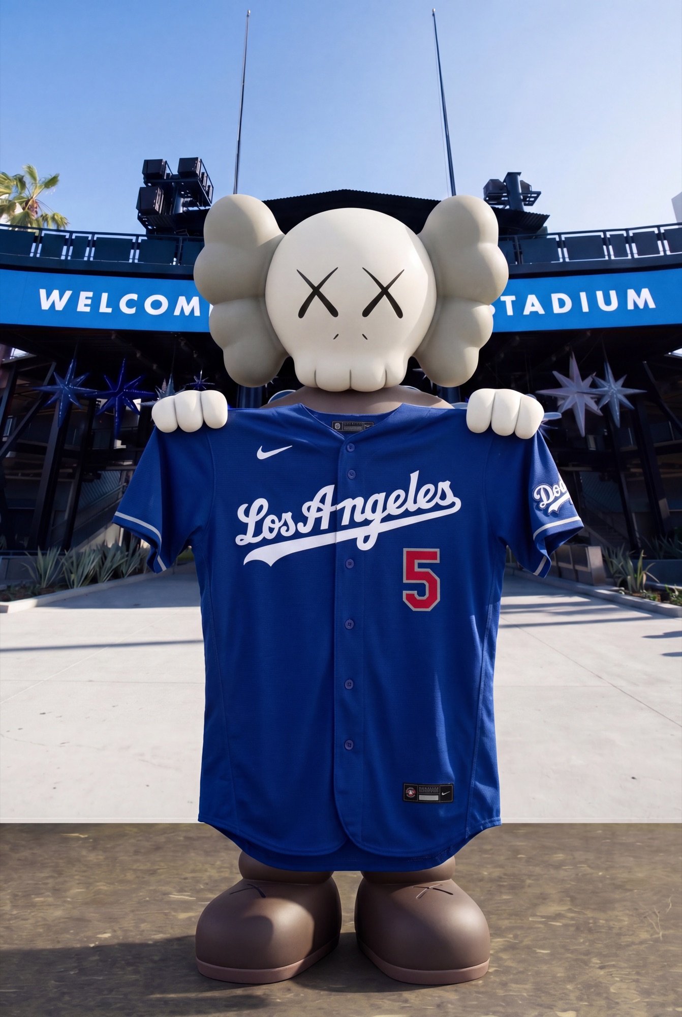 KAWS figure holding a Dodgers jersey